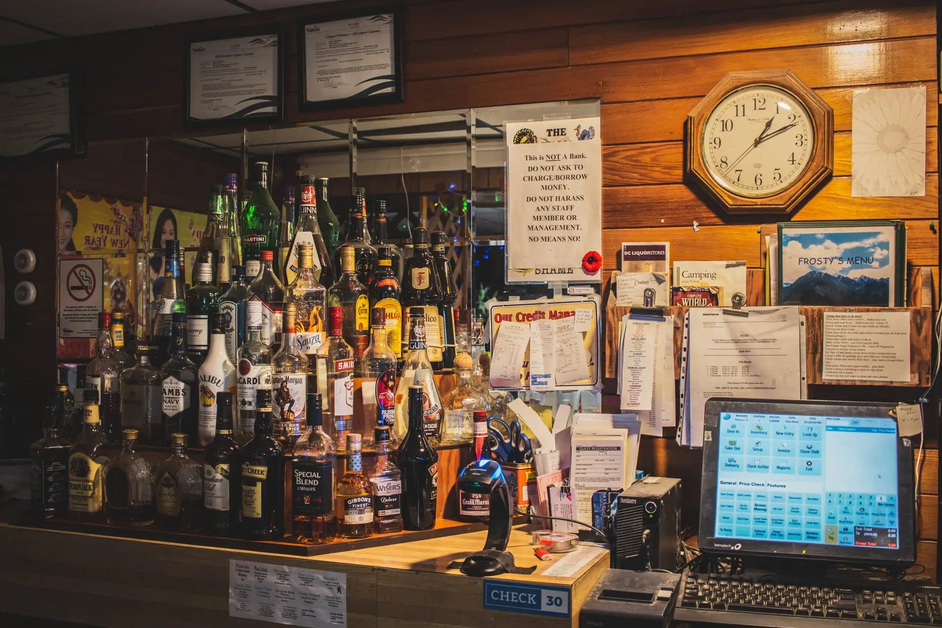 Cozy bar and lounge at Kluane Park Inn - Enjoy drinks and watch sports